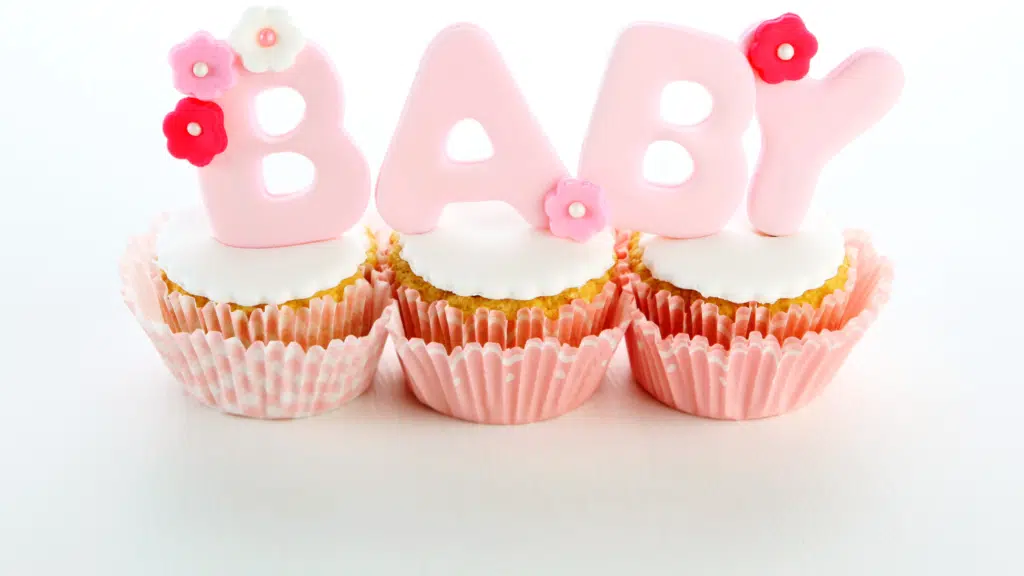 cupcakes with pink baby words for diaper baby shower